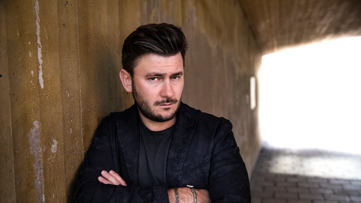 Hlavní obrázek článku: Autor knižné série Metro Dmitrij Gluchovskij byl ruským soudem odsouzen na 8 let vězení za šíření lží o ruské armádě